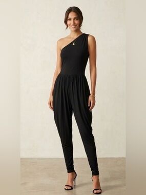stefanel one shoulder Harlem skinny jumpsuit
Size S